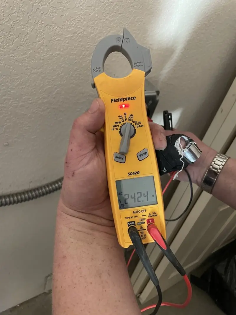 Voltage testing with clamp meter during Generator Installation in Greensburg